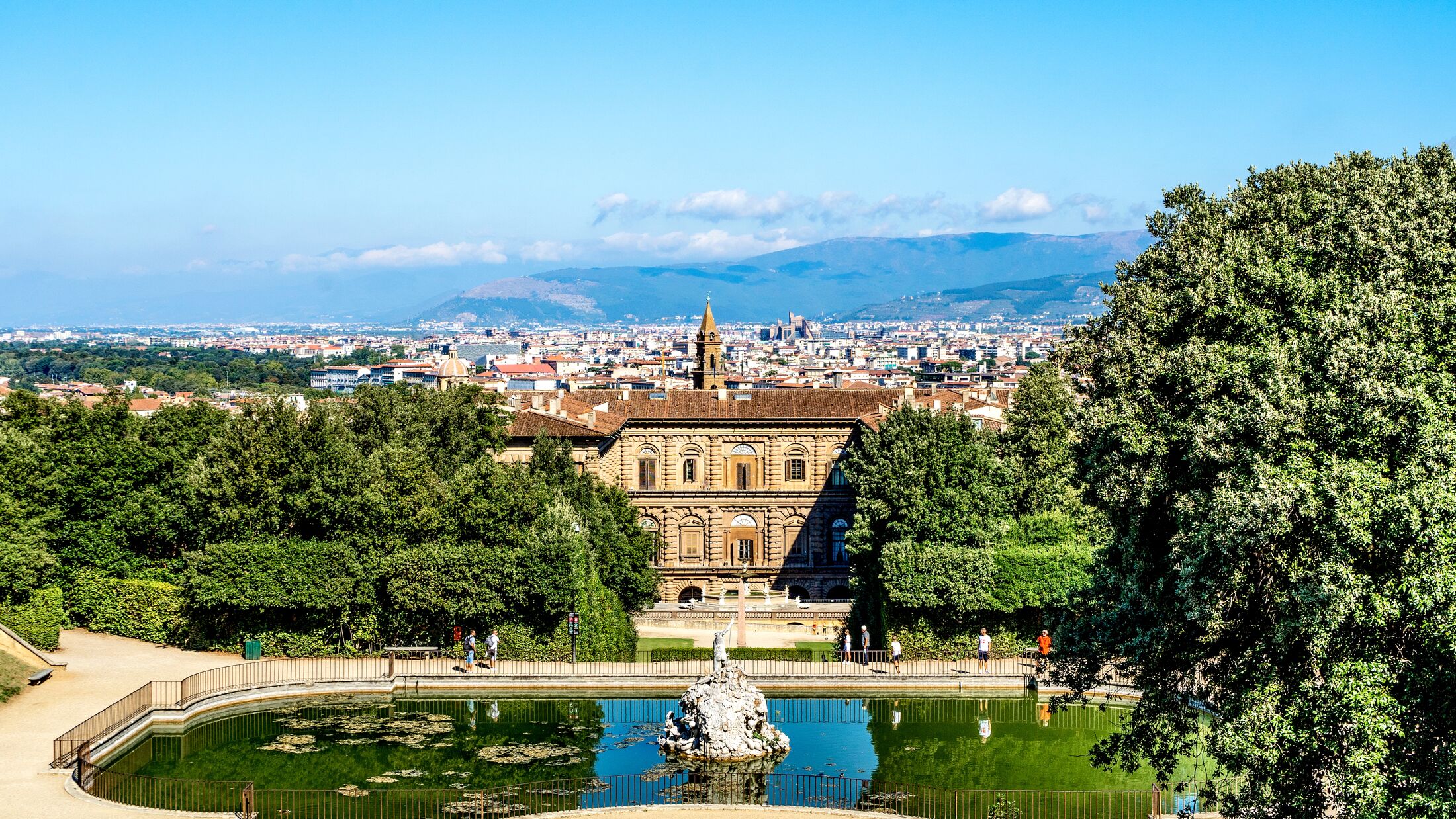 View of the Boboli Gardens, with the back façade of Pitti palace, Florence in the background,  Florence city center, Tuscany region, Italy