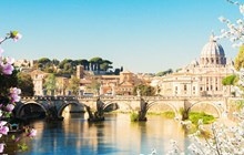 St. Peter's cathedral over bridge and river in Rome at spring day, Italy