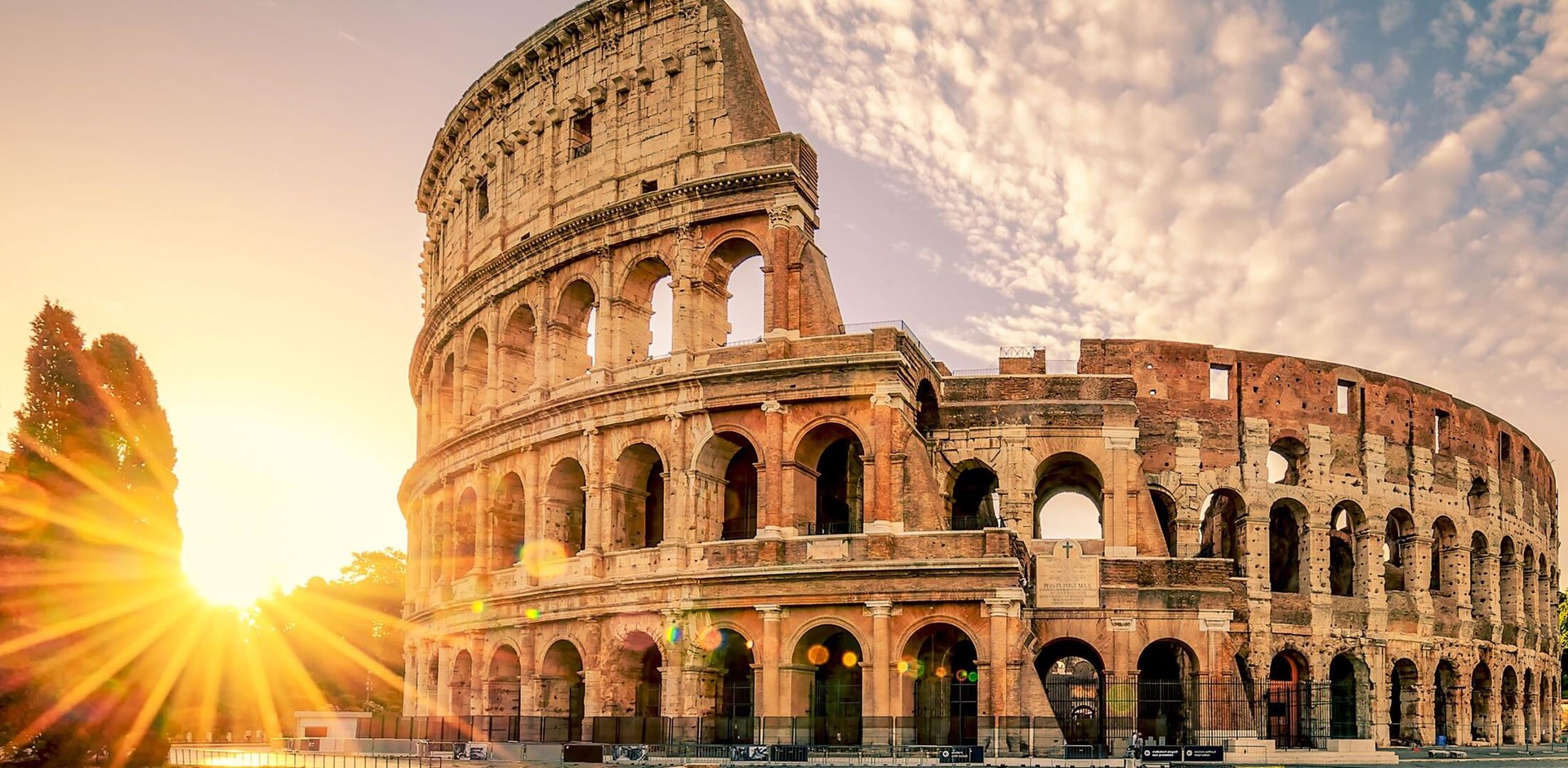 Colosseum in Rome at sunrise, Italy, Europe.