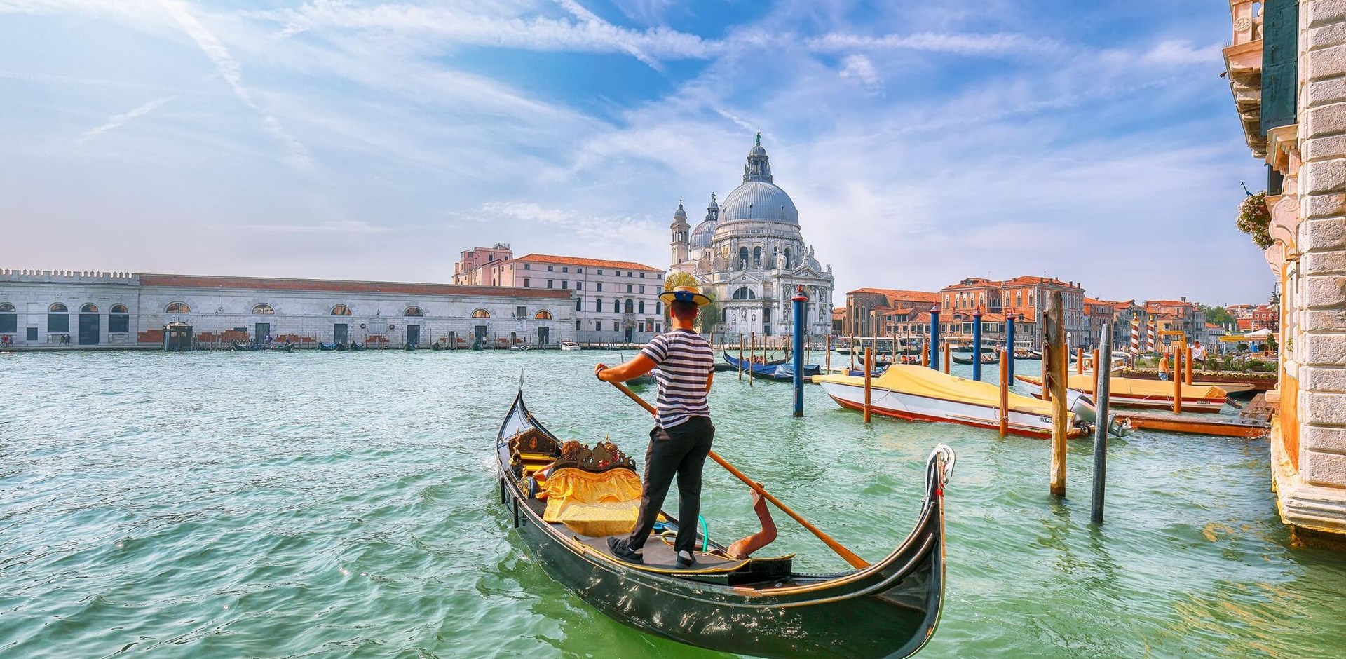 Breathtaking morning cityscape of Venice with famous Canal Grande and Basilica di Santa Maria della Salute church. Location: Venice, Veneto region, Italy, Europe