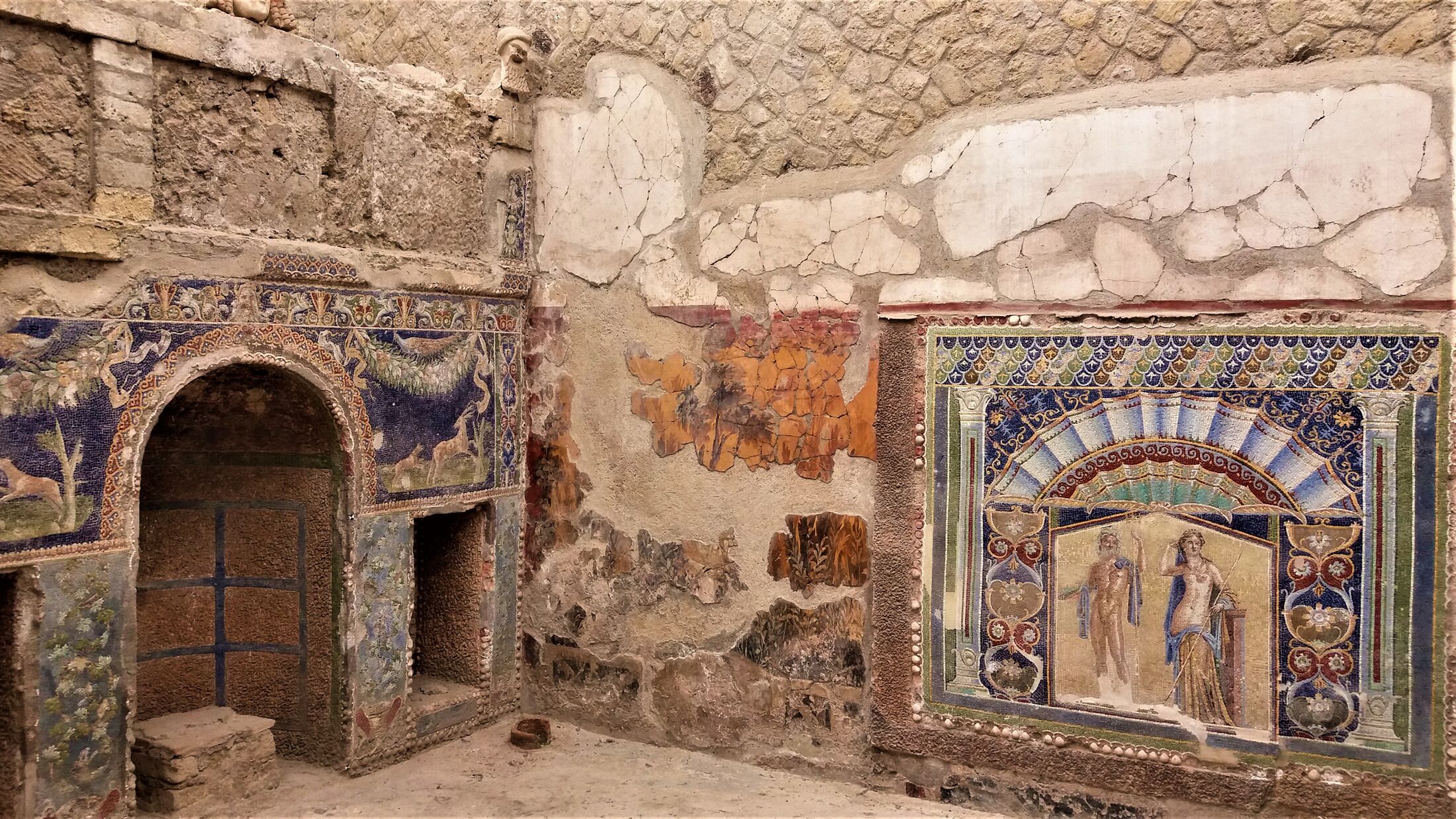 Ancient colourful mosaics in Herculaneum, Italy. Cruise ship travels.