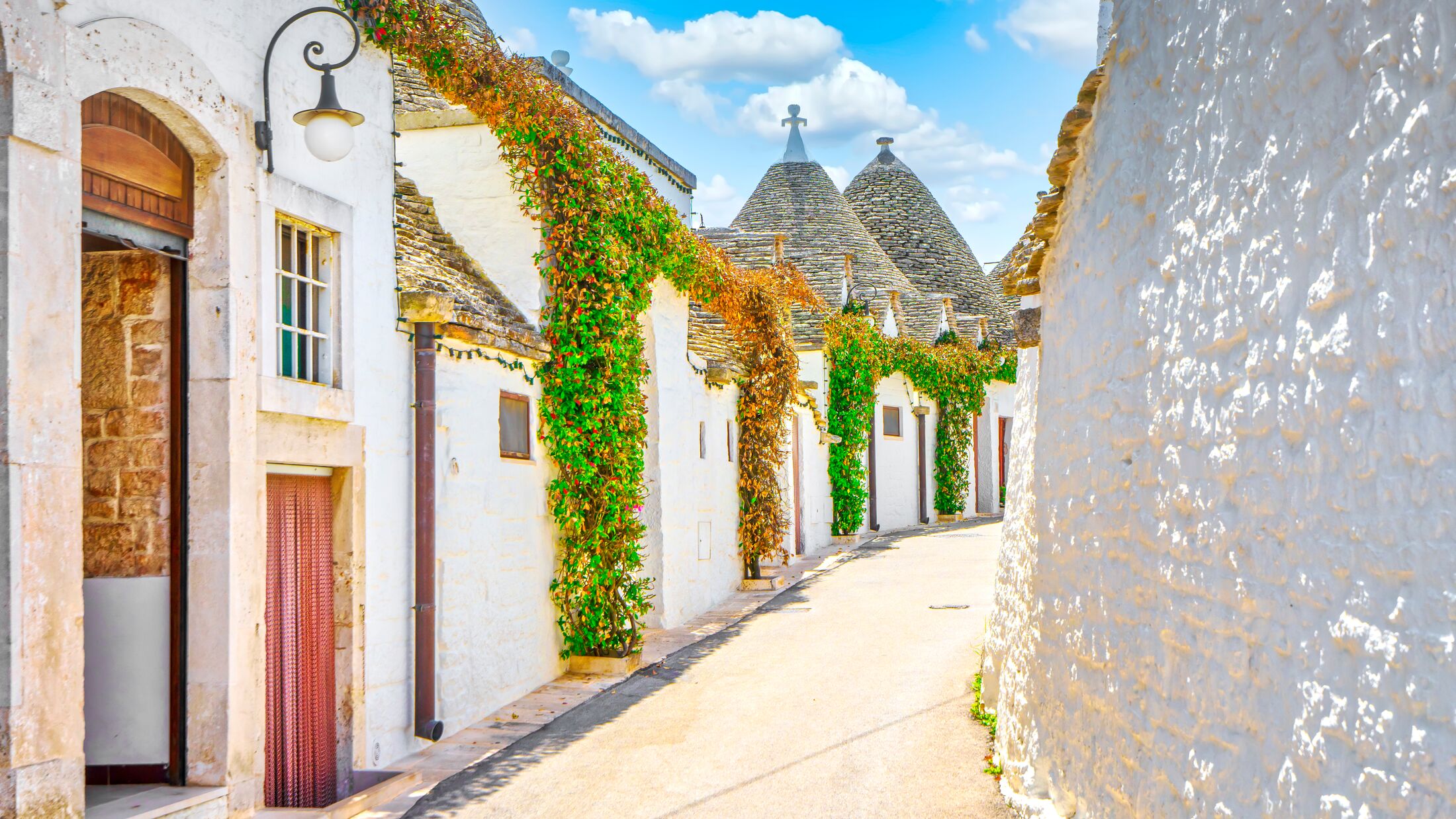 Trulli of Alberobello typical houses street view. Apulia, Italy. Europe.