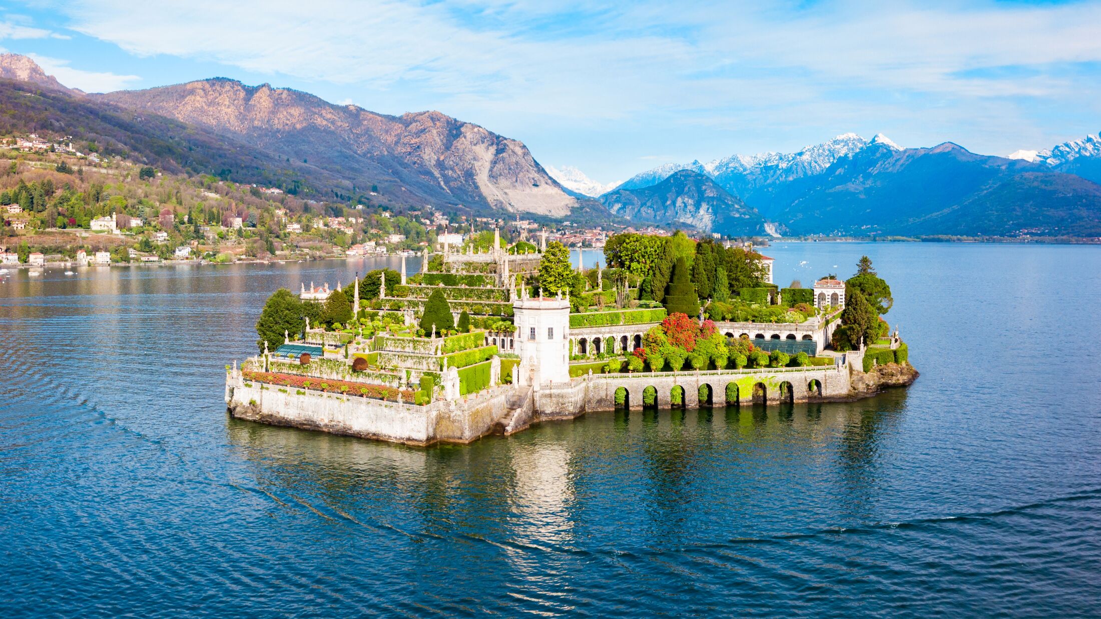 Isola Bella and Stresa town aerial panoramic view. Isola Bella is one of the Borromean Islands of Lago Maggiore in north Italy.