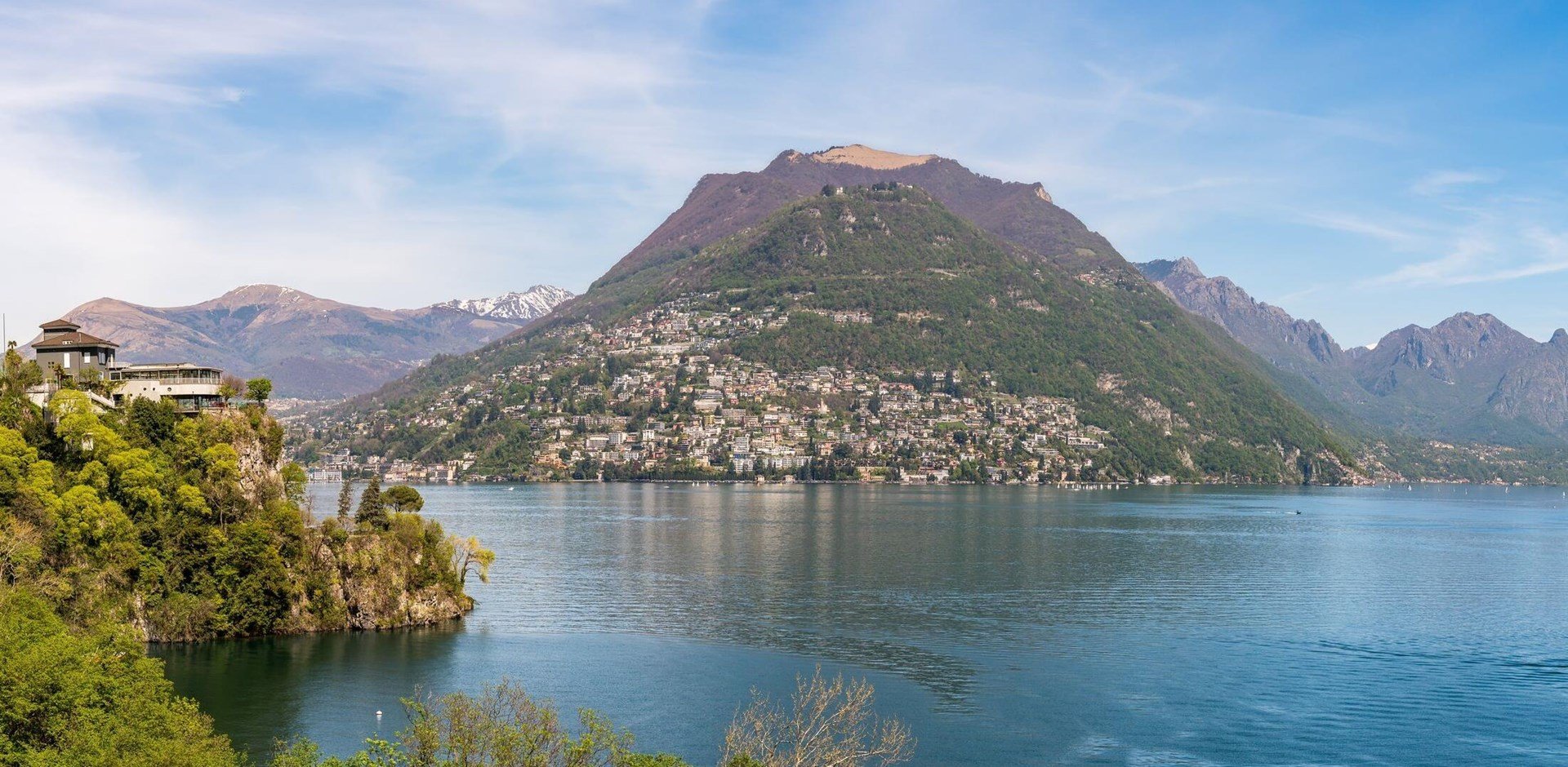 Landscape of Lake Lugano on a sunny spring day from Paradiso municipality of Lugano, canton of Ticino, Switzerland