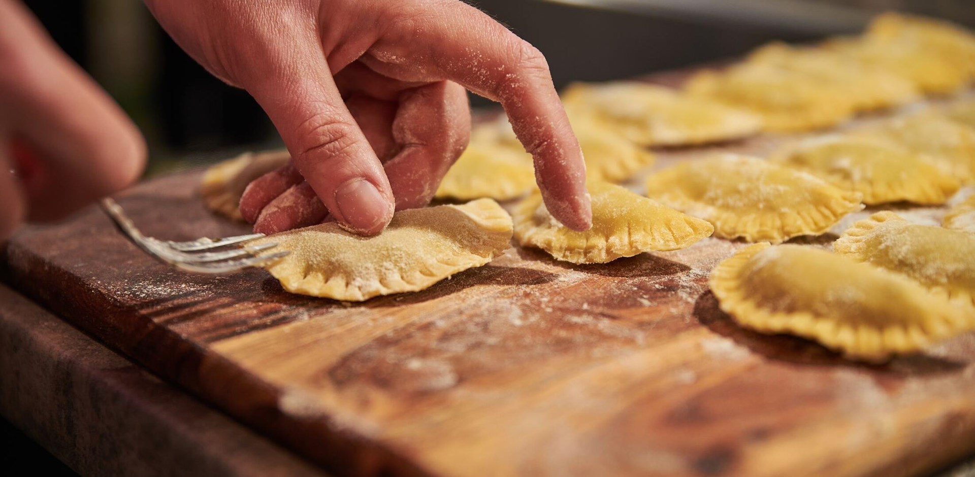 Preparing traditional italian ravioli. Homemade italian pasta.