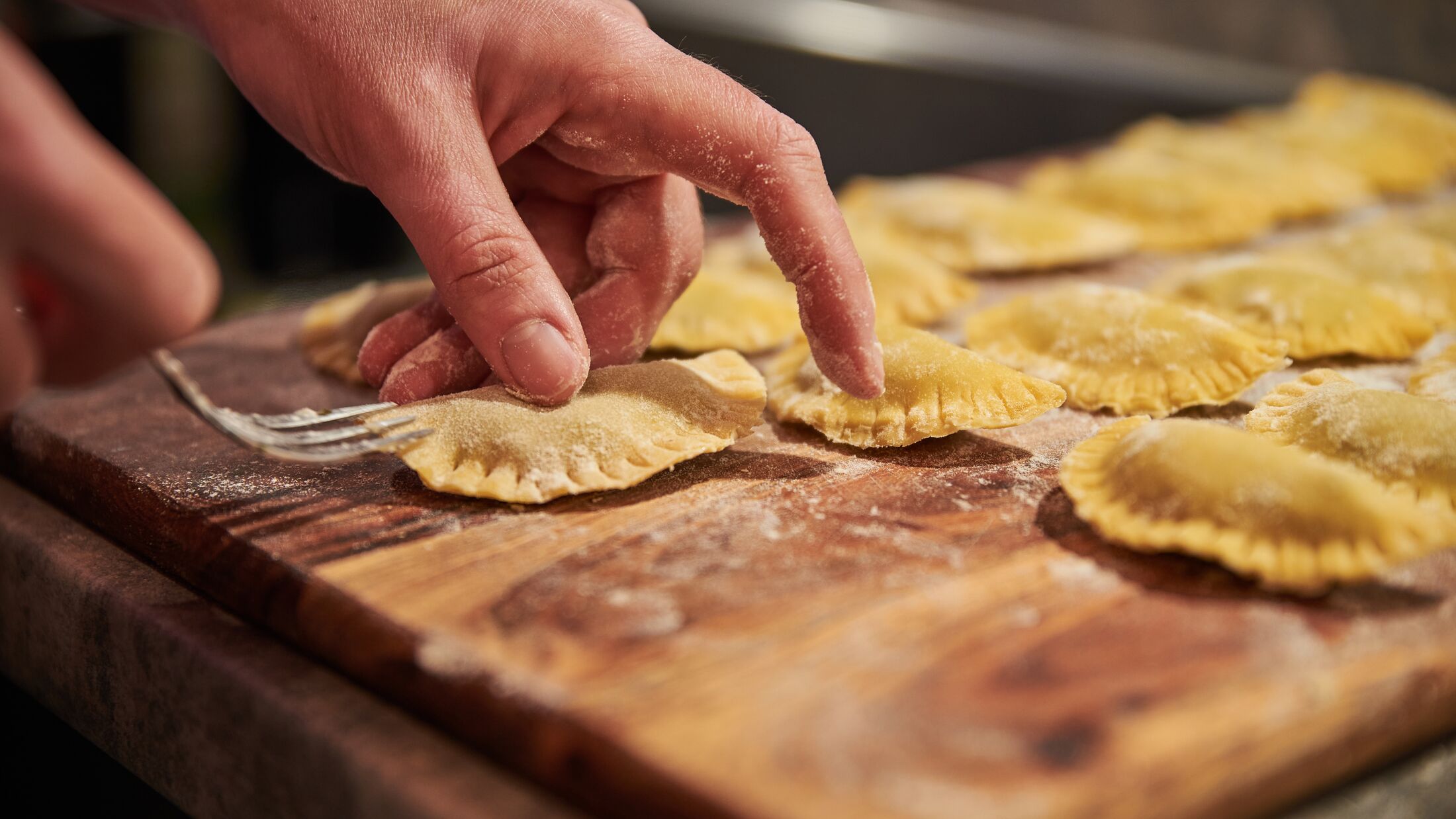 Preparing traditional italian ravioli. Homemade italian pasta.